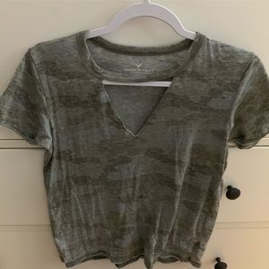 Woman’s camouflage cut out tee